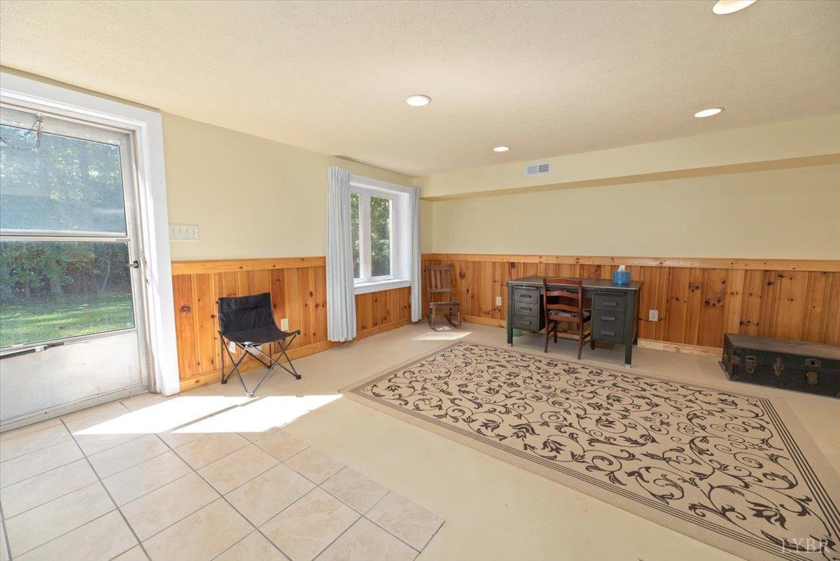 159 Blue Ridge Lane Amherst, VA 24521 - Photo 44 of 71 a view of a livingroom with furniture and a fireplace