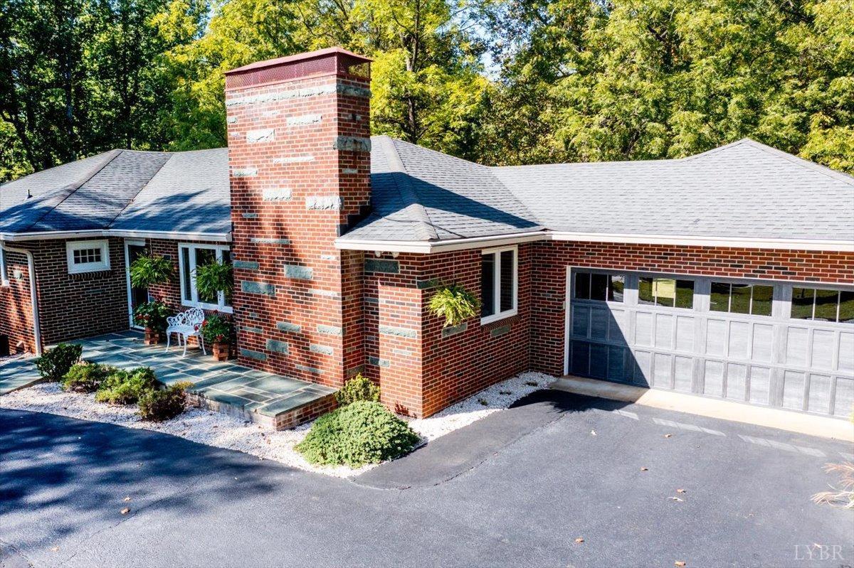 159 Blue Ridge Lane Amherst, VA 24521 - Photo 57 of 71 a front view of a house with garden