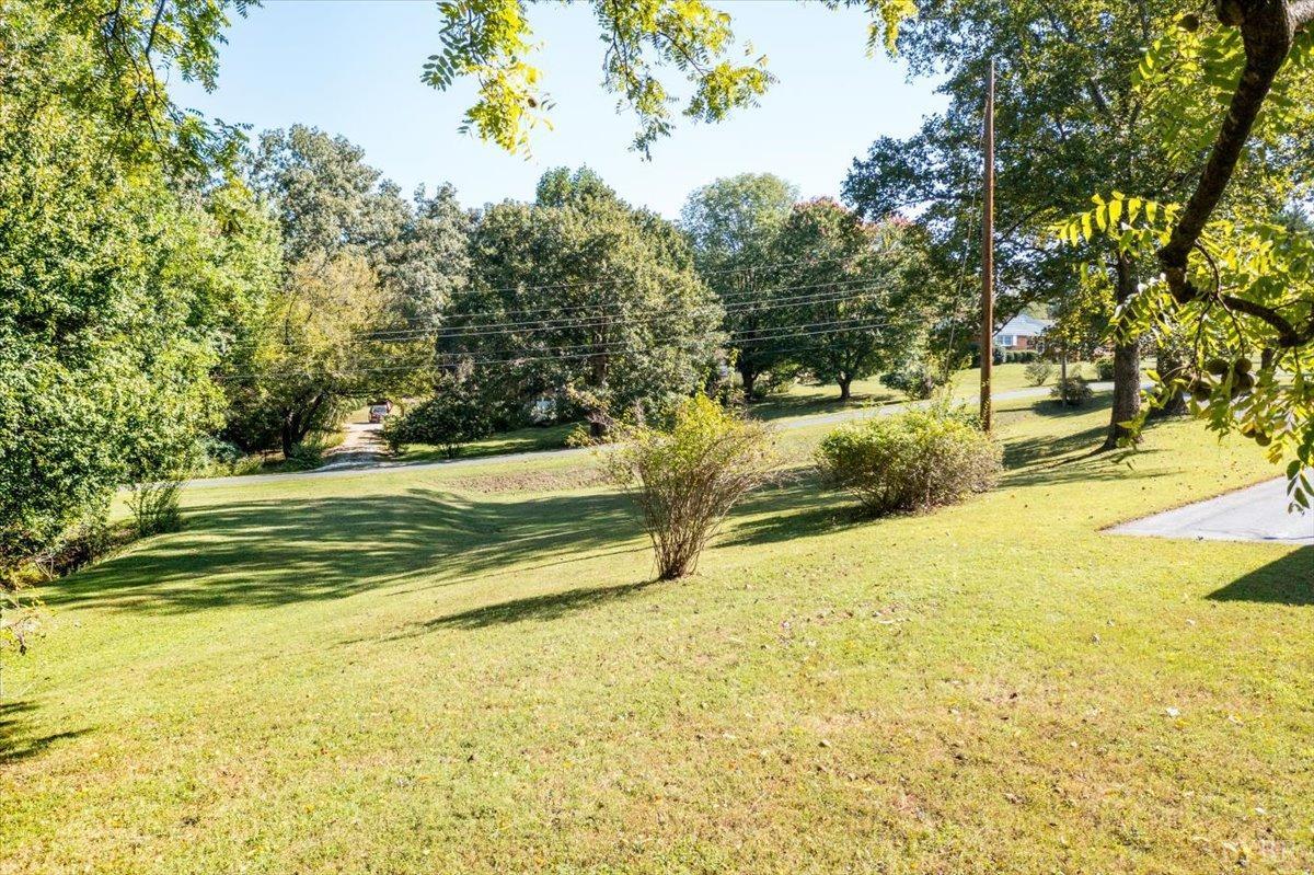 159 Blue Ridge Lane Amherst, VA 24521 - Photo 60 of 71 a view of a swimming pool with an outdoor space and seating area