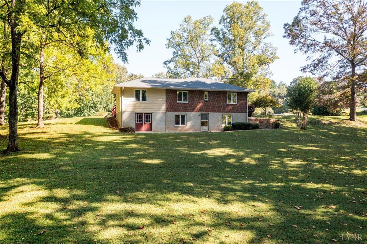 159 Blue Ridge Lane Amherst, VA 24521 - Photo 69 of 71 a front view of house with yard and trees