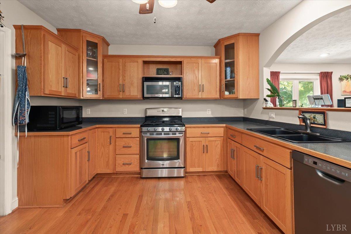 159 Blue Ridge Lane Amherst, VA 24521 - Photo 8 of 71 a kitchen with stainless steel appliances granite countertop a sink and cabinets