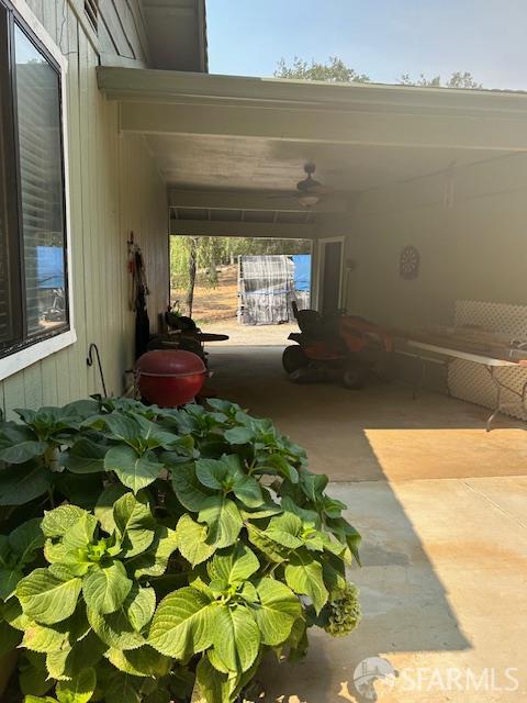 19481 Rambling Oak Drive Redding, CA 96003 - Photo 11 of 62 a backyard of a house with yard and outdoor seating