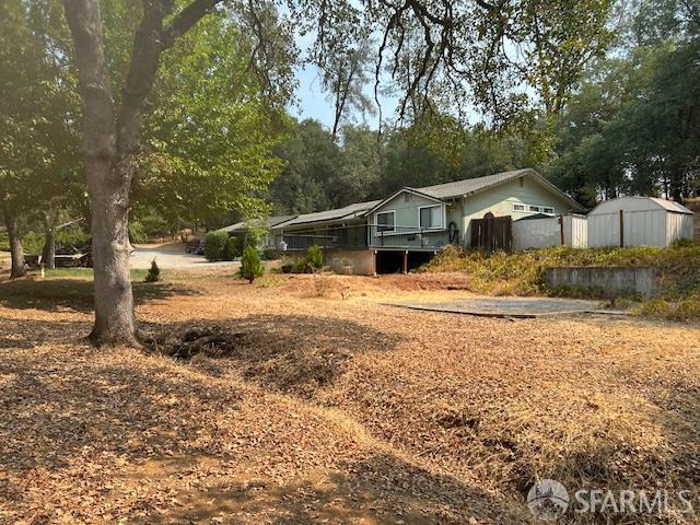 19481 Rambling Oak Drive Redding, CA 96003 - Photo 20 of 62 a view of a house with snow on the side of the road