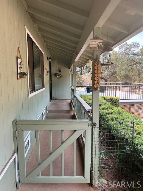 19481 Rambling Oak Drive Redding, CA 96003 - Photo 21 of 62 a view of a porch with furniture