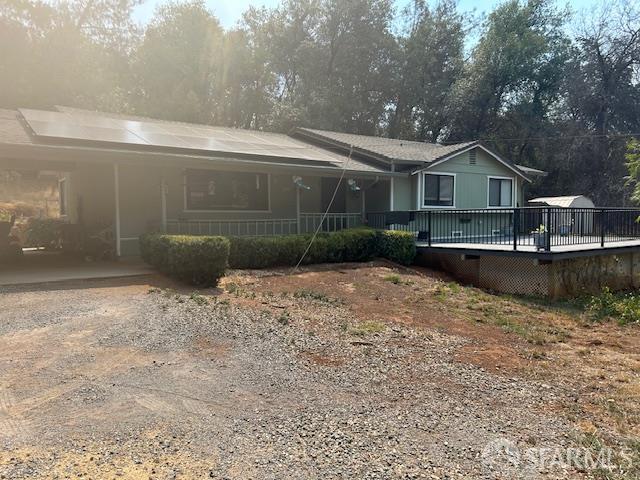 19481 Rambling Oak Drive Redding, CA 96003 - Photo 3 of 62 a backyard of a house