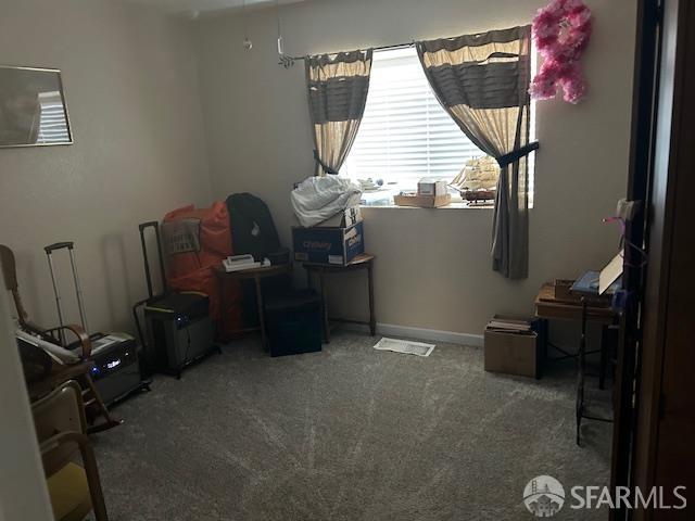 19481 Rambling Oak Drive Redding, CA 96003 - Photo 33 of 62 a room with furniture and a window