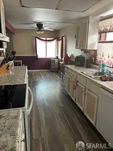 19481 Rambling Oak Drive Redding, CA 96003 - Photo 41 of 62 a kitchen with stainless steel appliances granite countertop a stove a sink and a refrigerator
