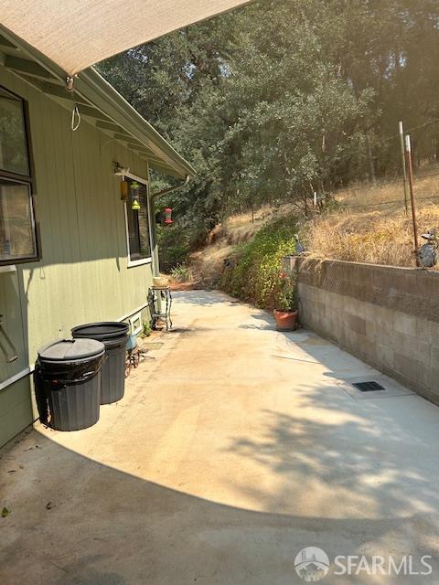 19481 Rambling Oak Drive Redding, CA 96003 - Photo 10 of 62 a view of backyard with barbeque grill and outdoor seating