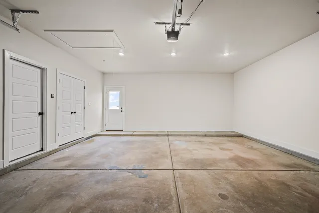 a spacious bathroom with a shower and a tub