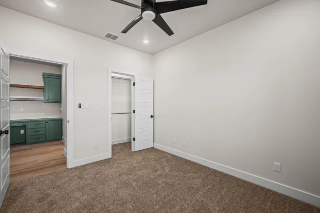 an empty room with a bathroom