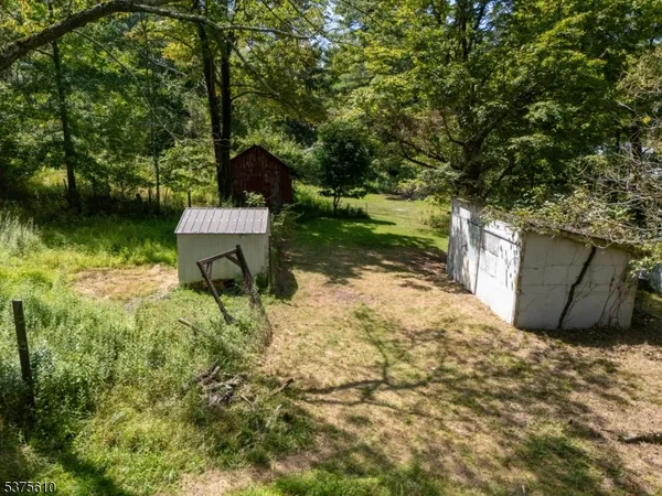 a view of a garden with a bench