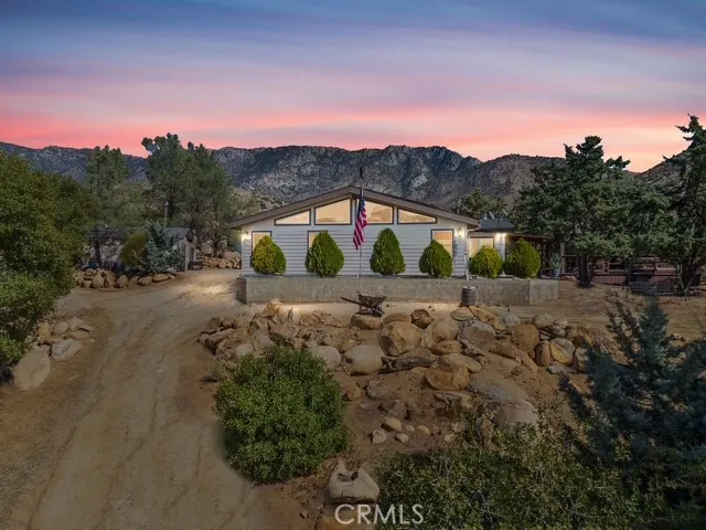a view of a big yard with green space
