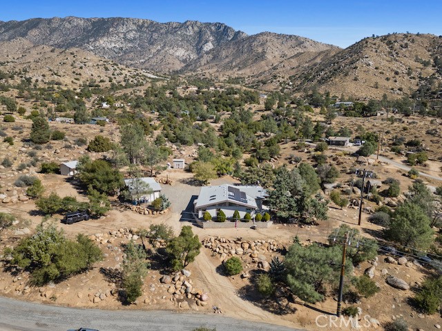 9780 Fay Ranch Road Weldon, CA 93283 - Photo 23 of 47 a view of a field with a mountain in the background