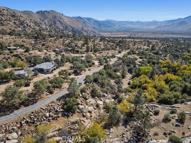 9780 Fay Ranch Road Weldon, CA 93283 - Photo 26 of 47 a view of a city with mountains in the background