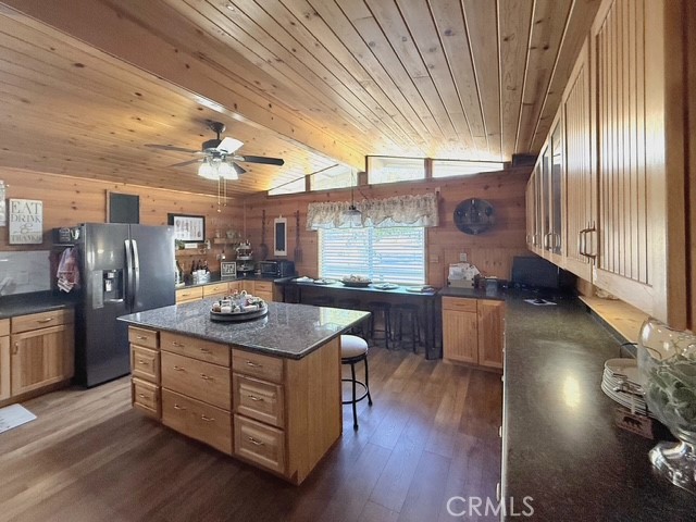 9780 Fay Ranch Road Weldon, CA 93283 - Photo 3 of 47 a kitchen with stainless steel appliances granite countertop a sink a stove and a wooden floors