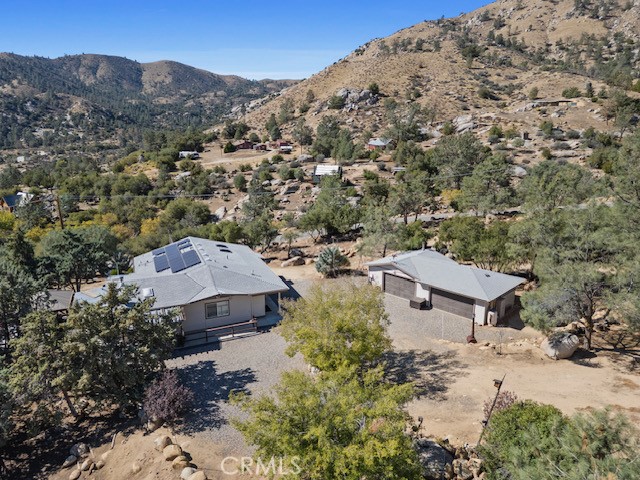 9780 Fay Ranch Road Weldon, CA 93283 - Photo 31 of 47 an aerial view of a house with a yard