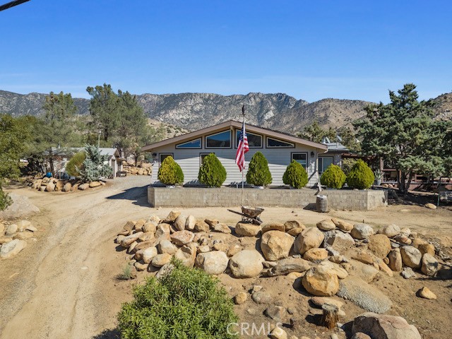9780 Fay Ranch Road Weldon, CA 93283 - Photo 33 of 47 a view of a backyard of the house
