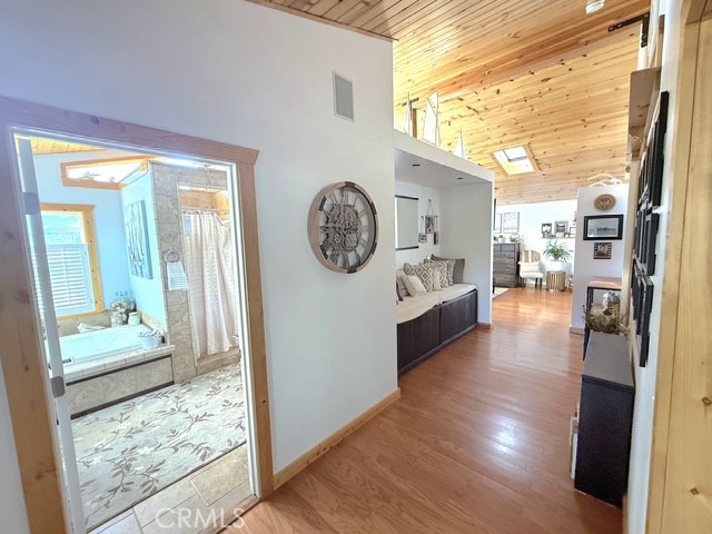 9780 Fay Ranch Road Weldon, CA 93283 - Photo 10 of 47 a view of a hallway with wooden floor and a living room
