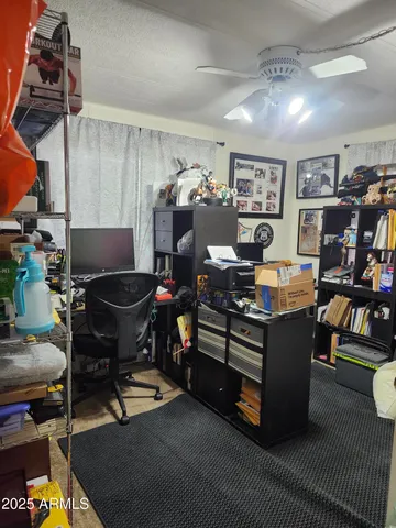 a room with furniture and musical instruments