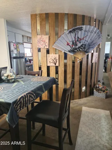 a view of a dining room with furniture