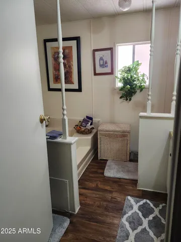 a bathroom with a sink toilet and a mirror