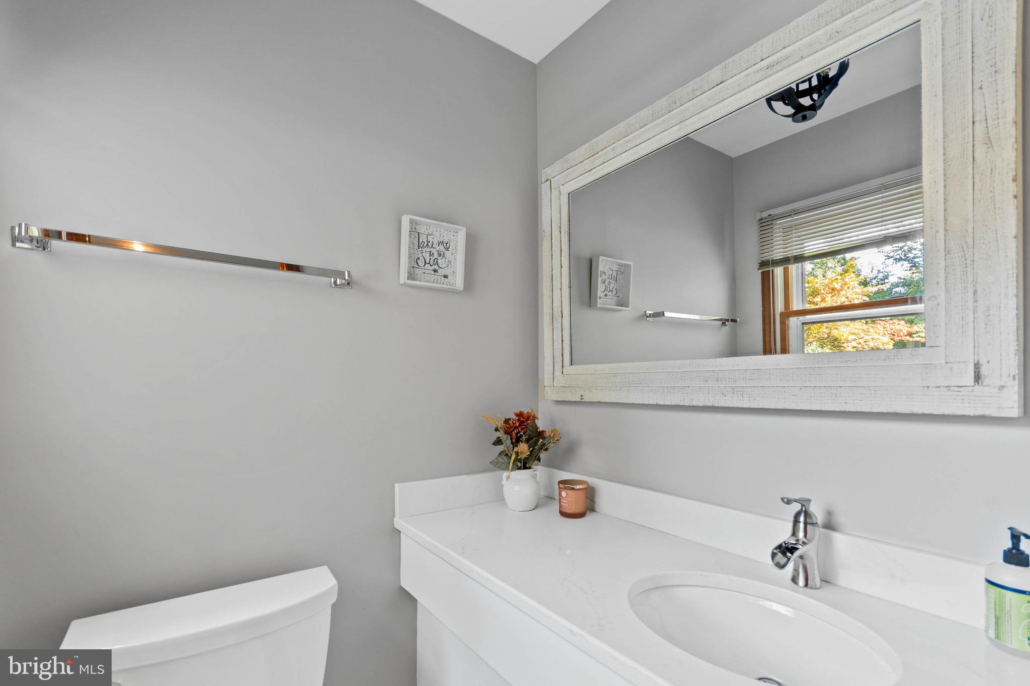 380 Heritage Road Sewell, NJ 08080 - Photo 27 of 56 a bathroom with a sink and a toilet