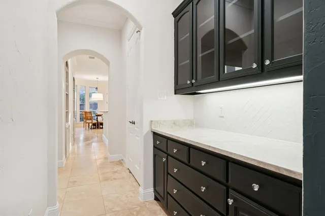 a view of a room with large windows