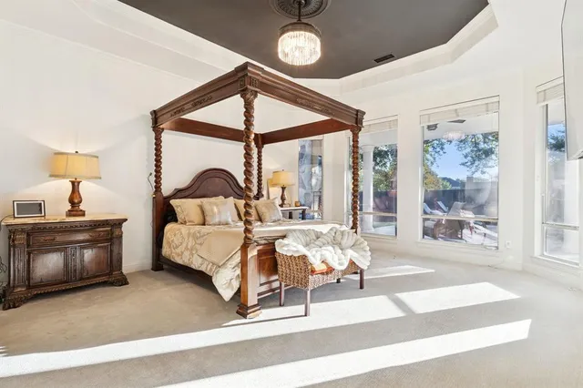 wooden floor with a sink and a mirror