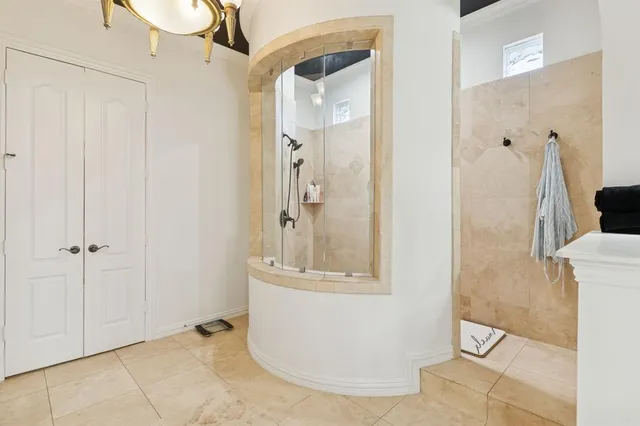 a bathroom with a sink double vanity and a bathtub
