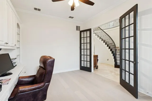 a view of hall way with furniture and stairs