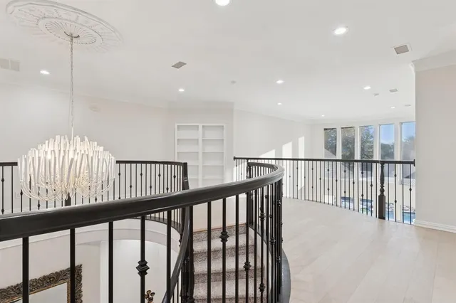 a view of staircase with large window