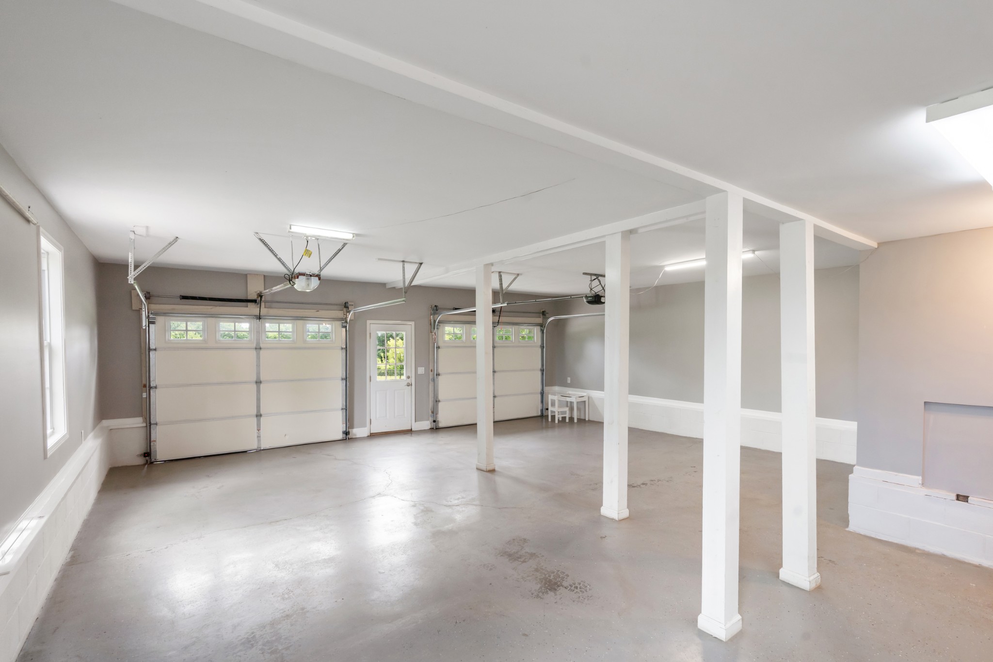 4602 Washington Road Springfield, TN 37172 - Photo 62 of 63 a view of a livingroom with wooden floor and a ceiling fan