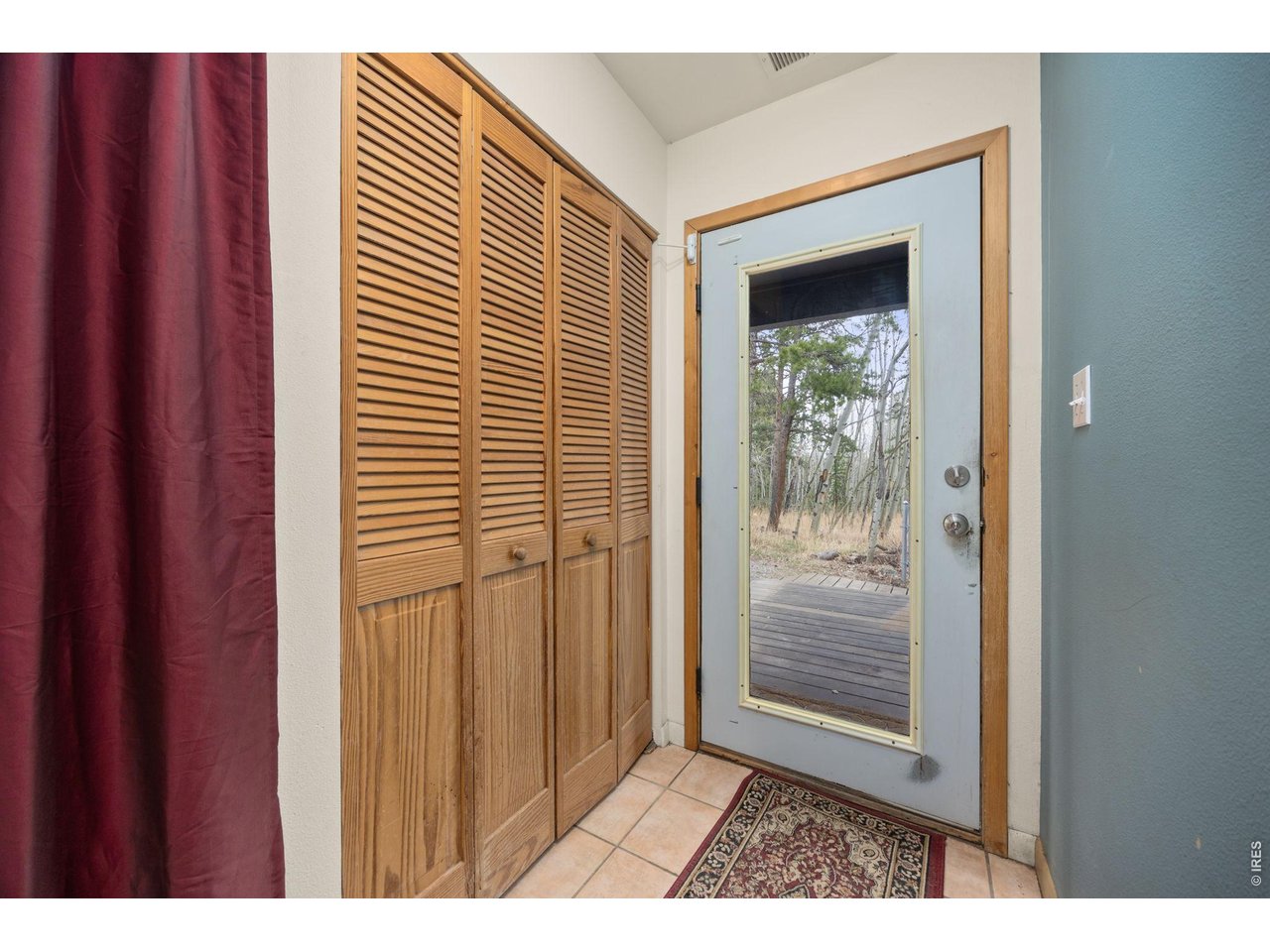 438 North County Road Rollinsville, CO 80474 - Photo 12 of 50 Tiled foyer with coat closet