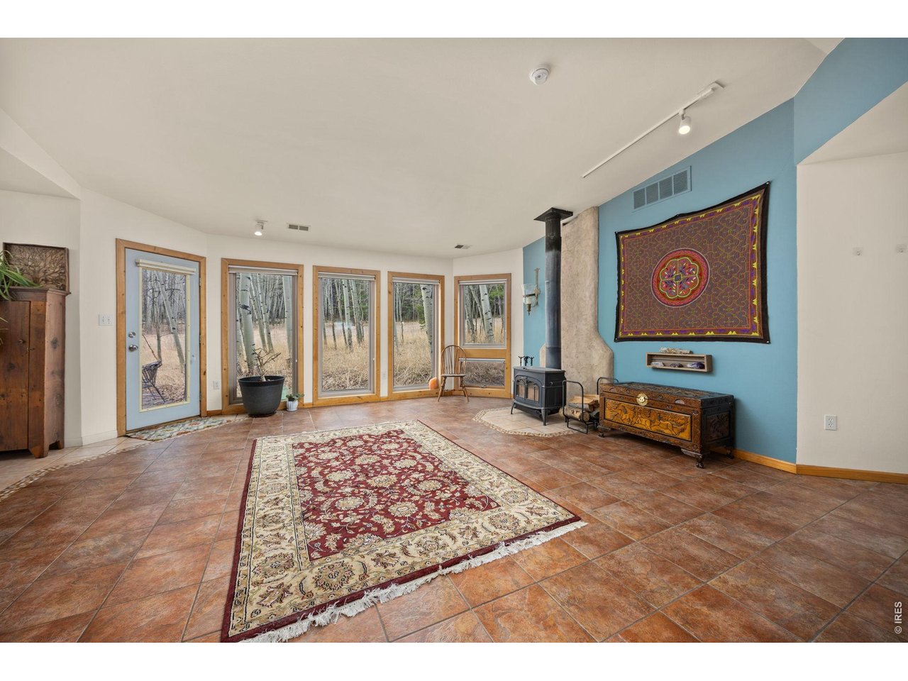 438 North County Road Rollinsville, CO 80474 - Photo 13 of 50 Living room features floor-to-ceiling windows