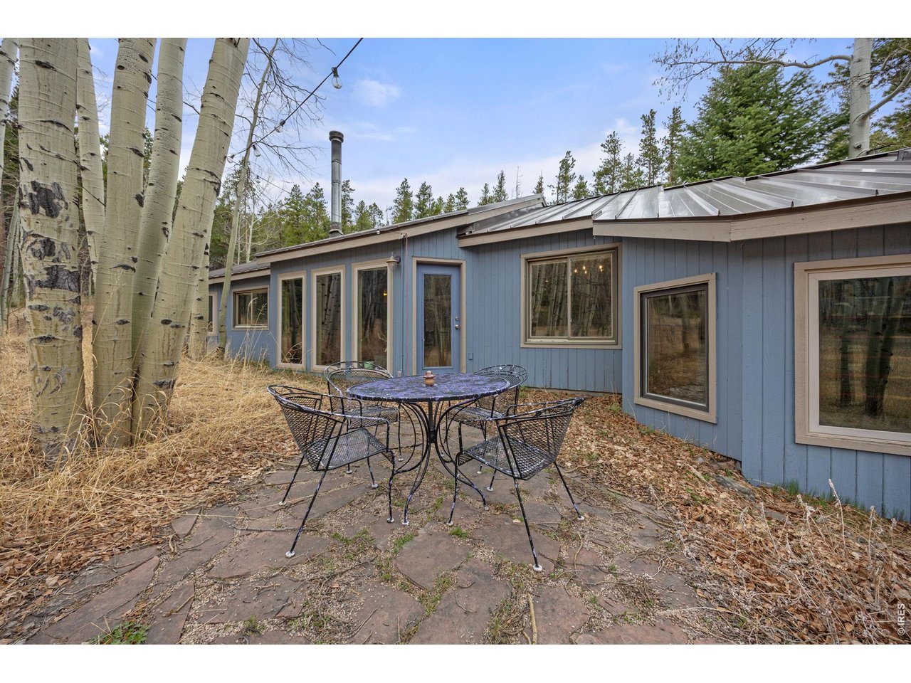 438 North County Road Rollinsville, CO 80474 - Photo 5 of 50 Sunny flagstone patio