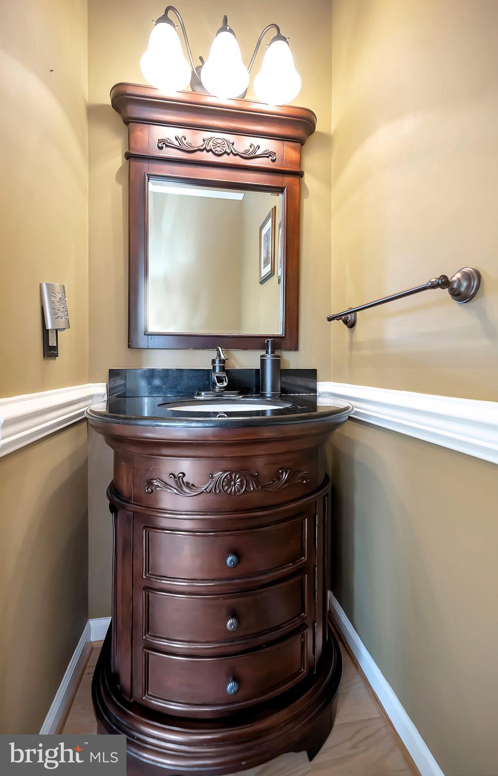27537 Mine Run Road Rhoadesville, VA 22542 - Photo 32 of 94 Main Level Half Bath Sink and Cabinet