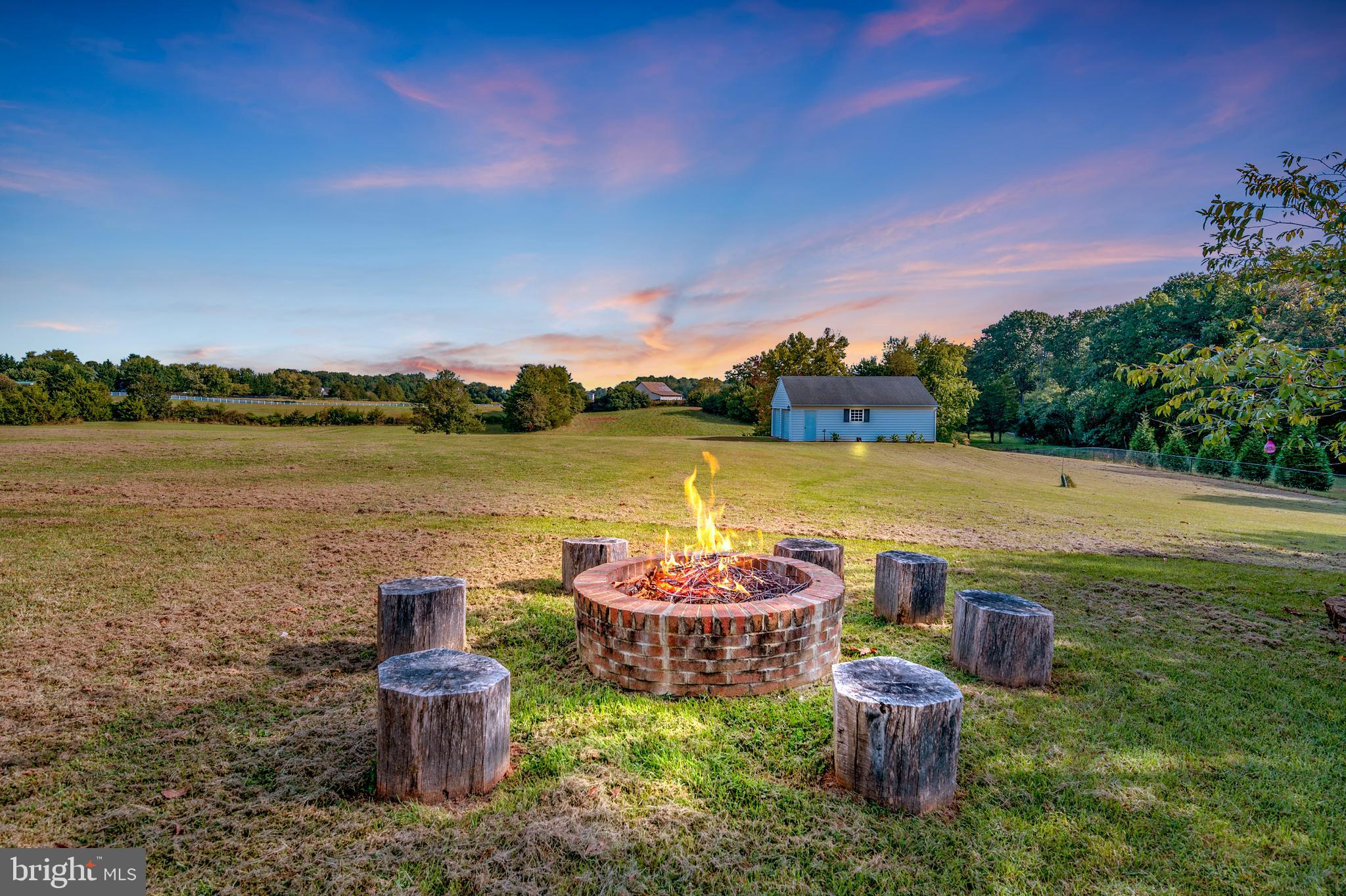 27537 Mine Run Road Rhoadesville, VA 22542 - Photo 46 of 94 Firepit in Backyard with Simulated Flame Photo 1