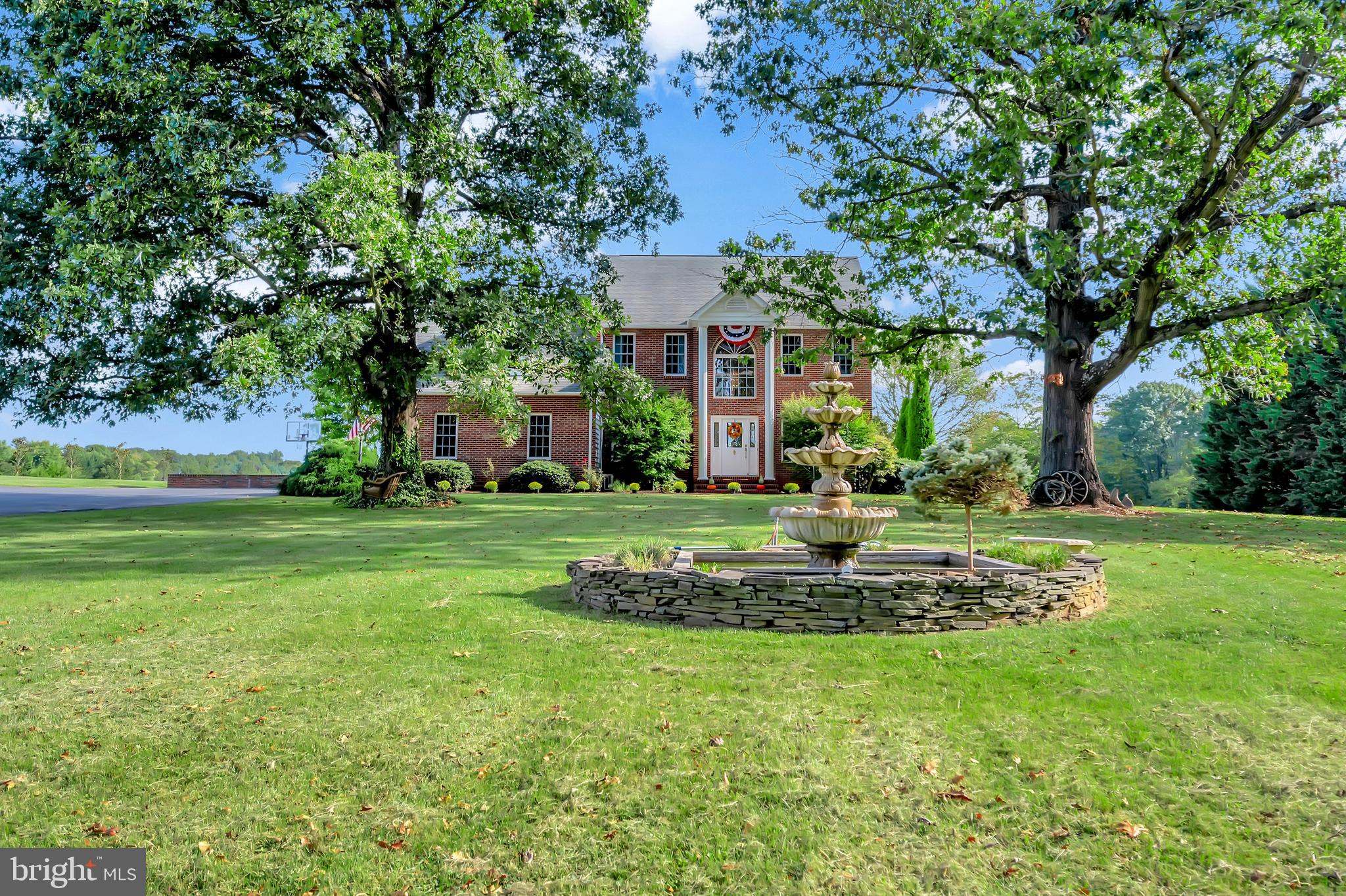 27537 Mine Run Road Rhoadesville, VA 22542 - Photo 7 of 94 Front Exterior with Water Fountain & Fish Pond