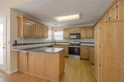 $354,950 | 5509 Northeast Wildflower Court, Lee's Summit, MO 64064