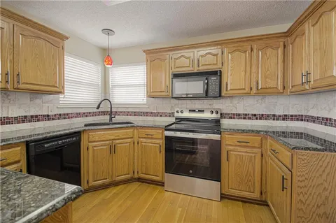 $354,950 | 5509 Northeast Wildflower Court, Lee's Summit, MO 64064