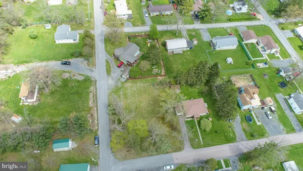 a view of a lake with a yard