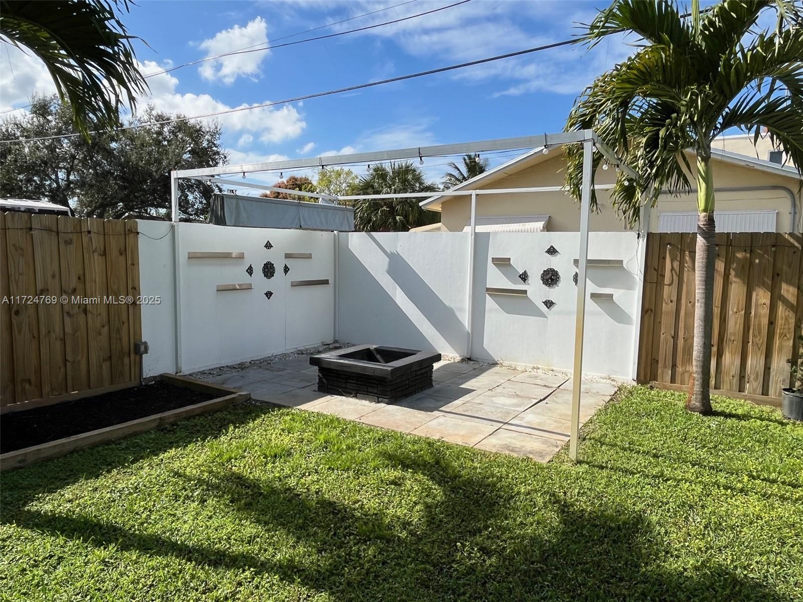 1600 North 56th Avenue Hollywood, FL 33021 - Photo 18 of 25 a view of a backyard