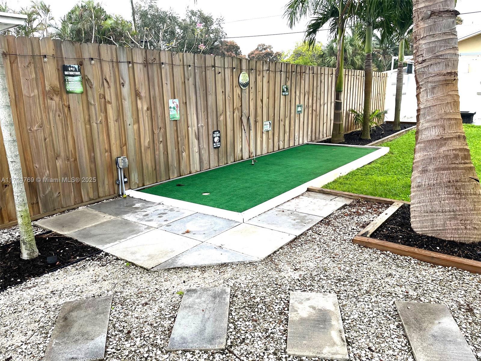 1600 North 56th Avenue Hollywood, FL 33021 - Photo 22 of 25 a view of a backyard with a garden