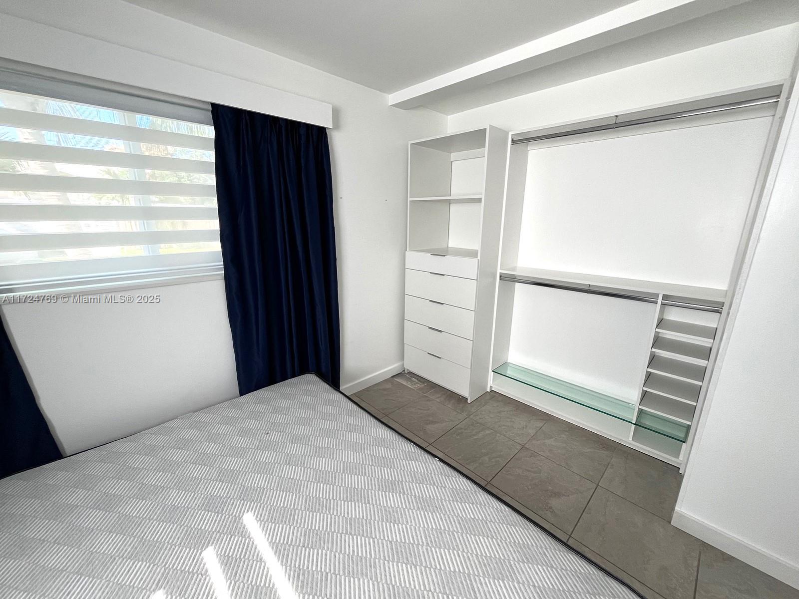 1600 North 56th Avenue Hollywood, FL 33021 - Photo 9 of 25 a view of an empty room and window