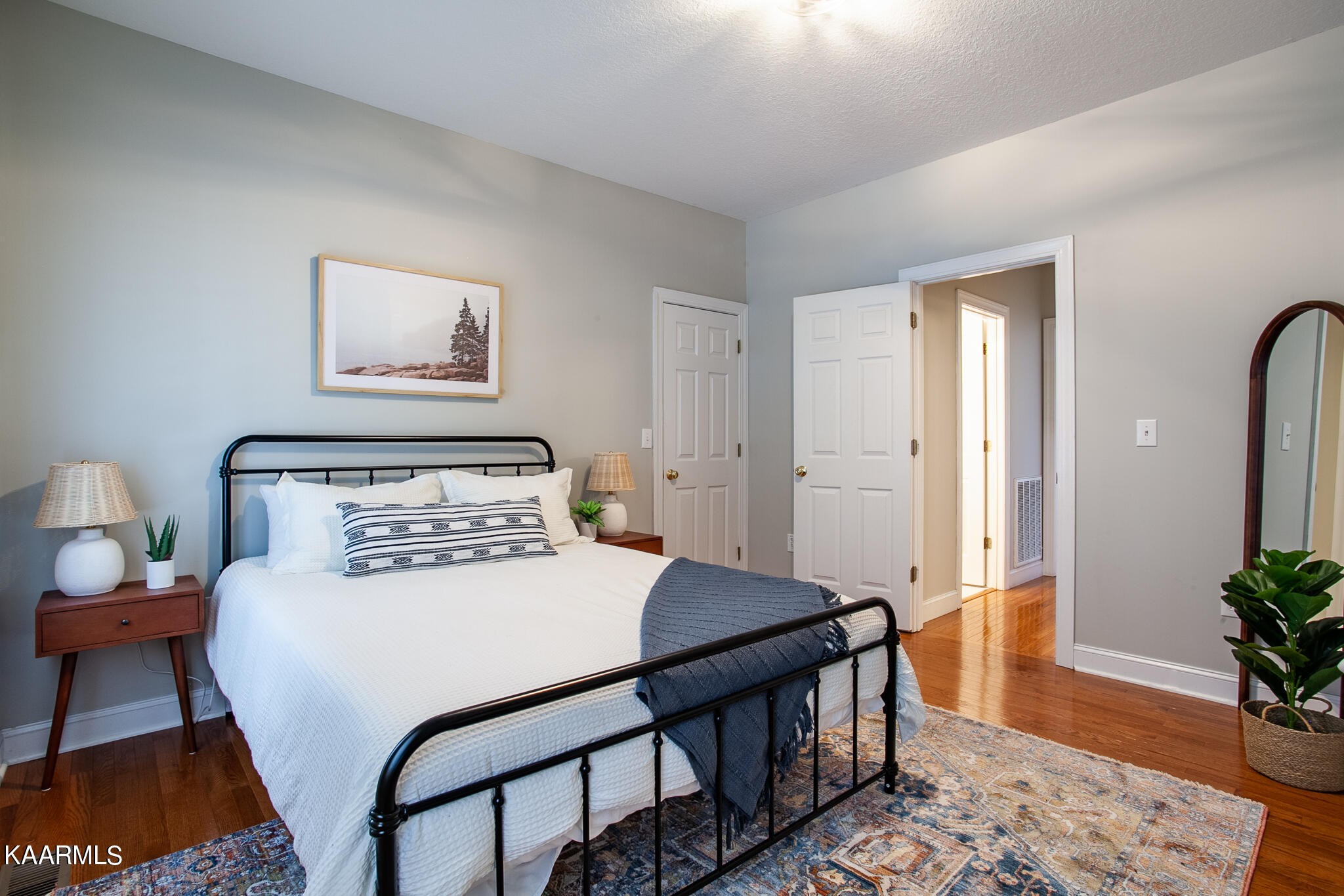 610 Dry Valley Road Townsend, TN 37882 - Photo 23 of 37 a bedroom with a bed table and a potted plant