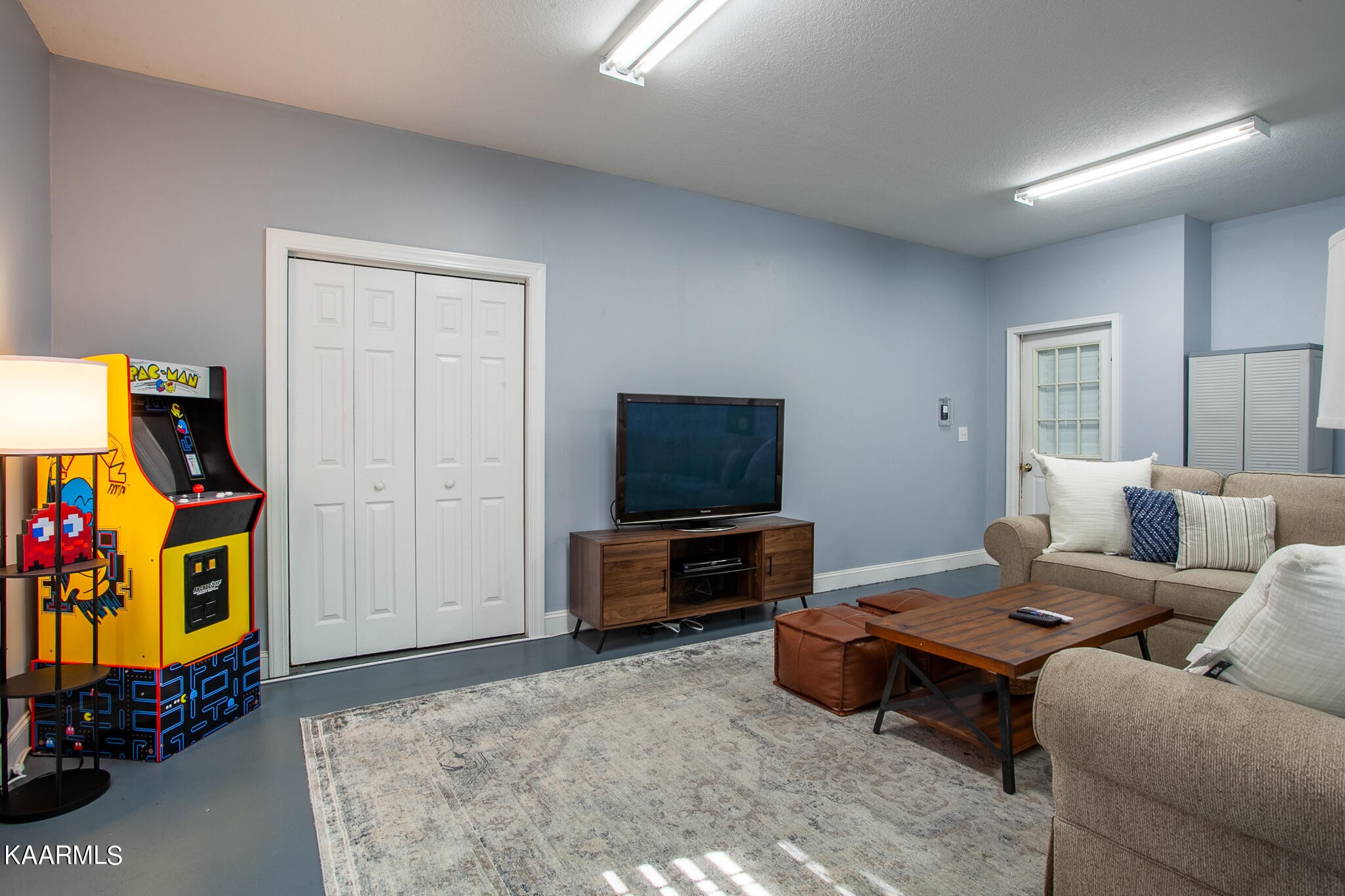 610 Dry Valley Road Townsend, TN 37882 - Photo 32 of 37 a living room with furniture and a flat screen tv