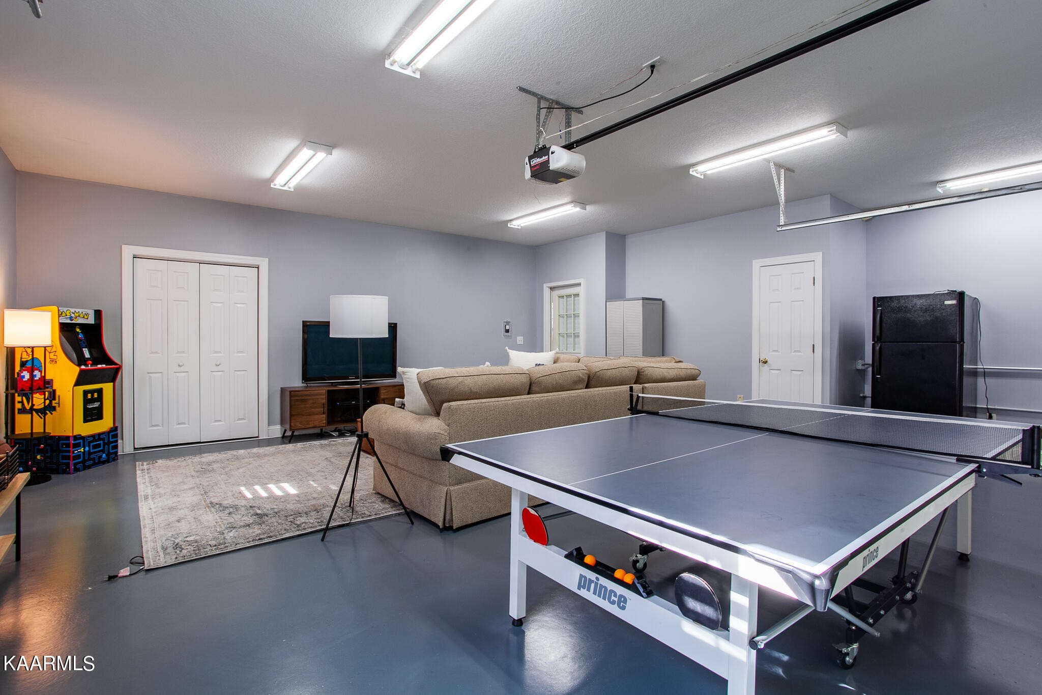 610 Dry Valley Road Townsend, TN 37882 - Photo 33 of 37 a kitchen with stainless steel appliances granite countertop a sink a stove and a refrigerator