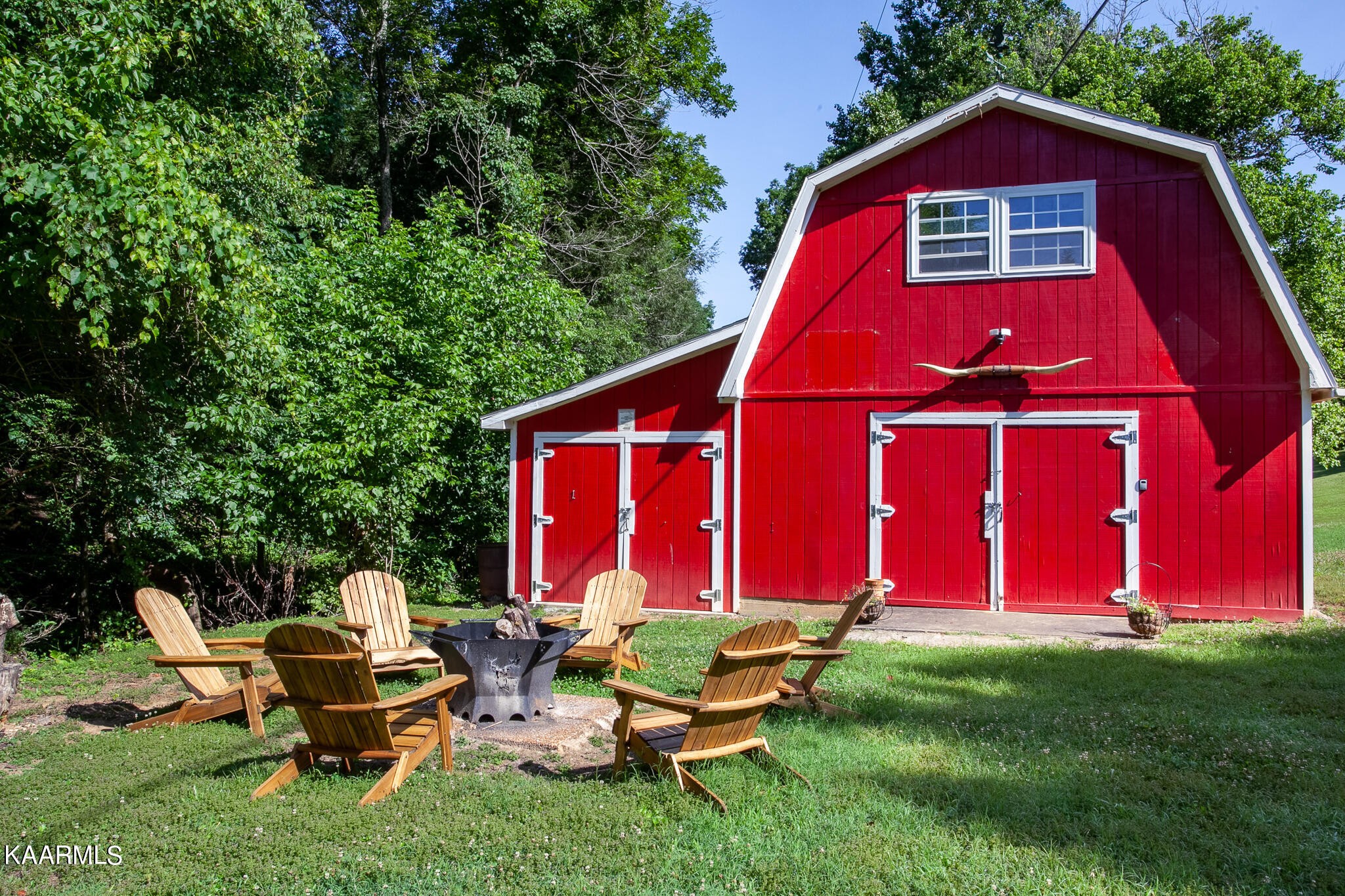 610 Dry Valley Road Townsend, TN 37882 - Photo 35 of 37 a view of backyard of house with outdoor seating and green space