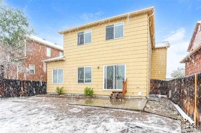 a front view of a house with patio