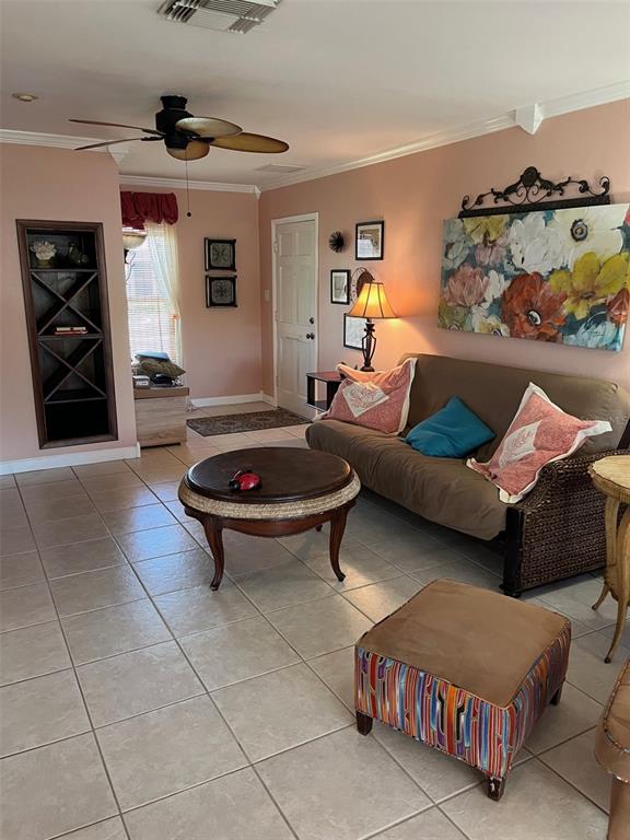 8372 Candlewood Road Seminole, FL 33777 - Photo 4 of 13 a living room with furniture and a window